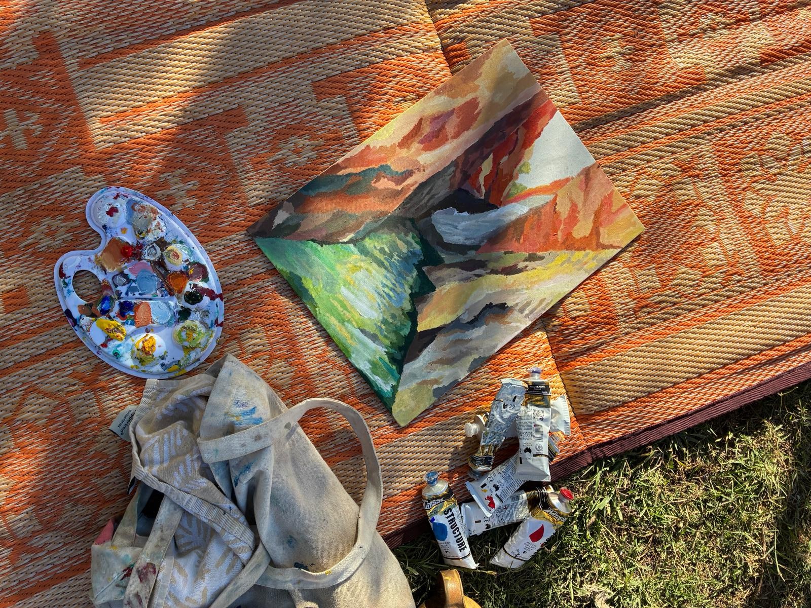 Art laid out on a mat